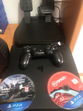 PS4 Slim + Volante + Mando + 20 Juegos
