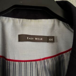 Americana mujer azul marino.