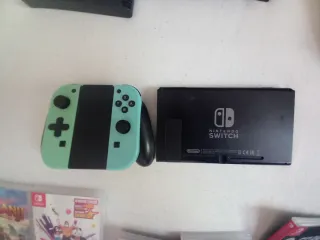 Nintendo Switch + Accesorios y Juegos