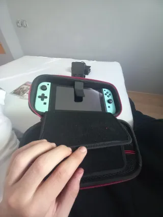 Nintendo Switch + Accesorios y Juegos