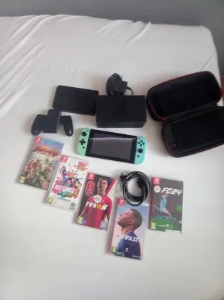 Nintendo Switch + Accesorios y Juegos