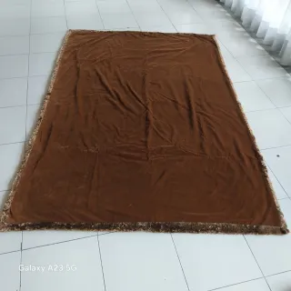 Manta em pêlo caraculo castanha