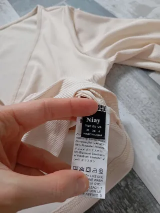 Jersey beige manga larga