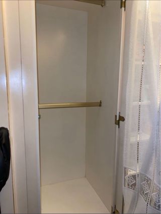 Armario de 4 puertas de madera beige y cristales