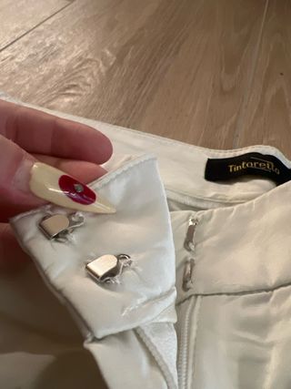 Pantalones elegantes blancos