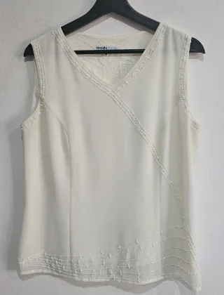 Blusa Modcatela Talla 46, beige.