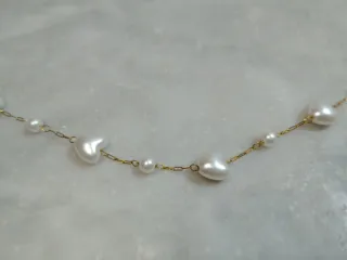 Collana con perle a cuore dorata