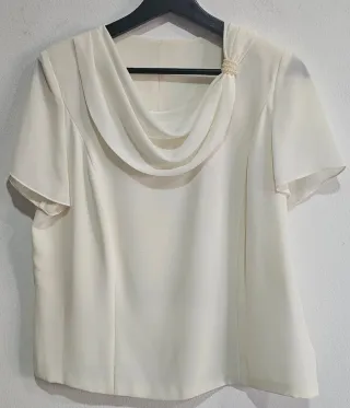 Blusa elegante drapeado.