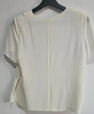 Blusa elegante drapeado.