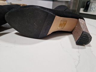 Botines Fórmula Tacón Dorado Negro