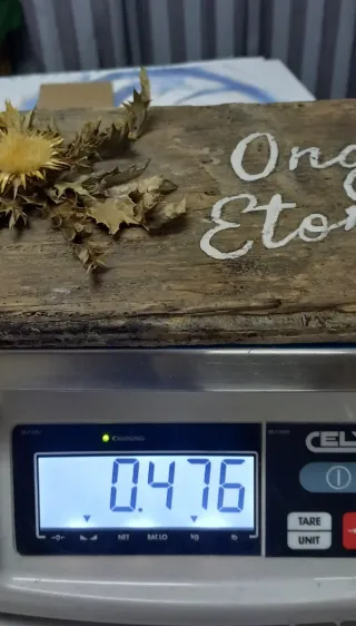 Eguzkilore artesanal sobre madera vieja,OngiEtorri