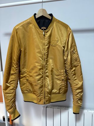 Bomber reversible SikSilk negra y dorada