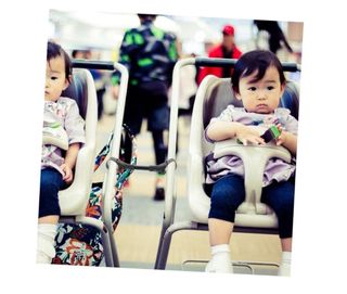 conector ajustable para cochecito gemelar