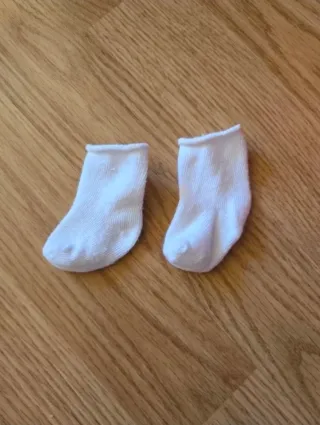 Muñeca realista con ropa y accesorios