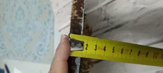 Eguzkilore artesanal sobre tronco fino de madera