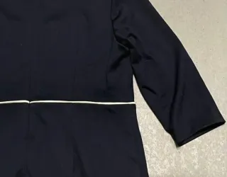 Conjunto chaqueta y vestido negro