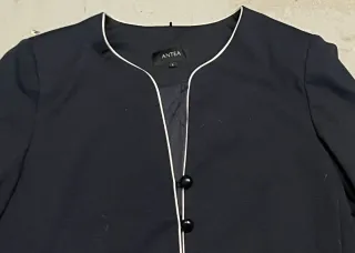 Conjunto chaqueta y vestido negro