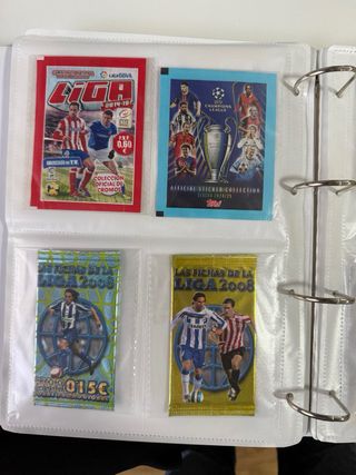 49 sobres fútbol y basket de diferentes años.