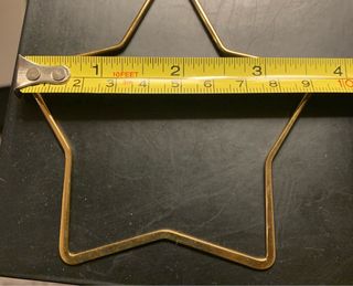 Orecchini a forma di stella metallo dorato