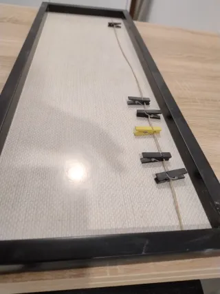 Marco de fotos con pinzas