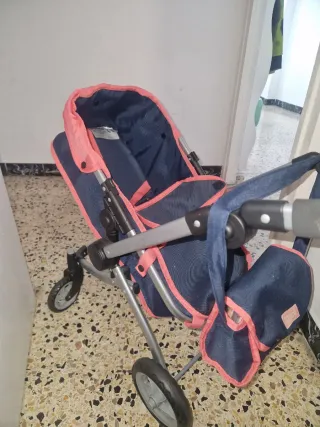 Carrito de muñecas azul y rosa
