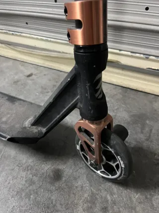 Patinete freestyle negro y cobre