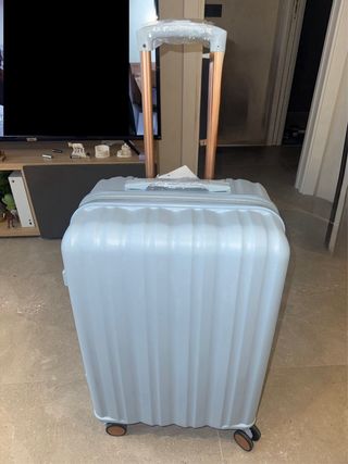 Maleta de viaje 20kg azul y dorado