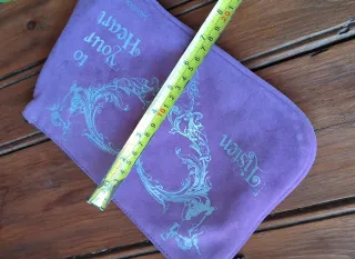 Neceser morado con corazón y estrellas