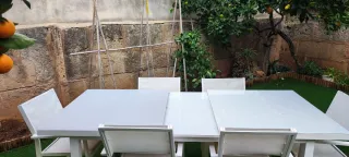 Mesa extensible aluminio y cristal y 6 sillas