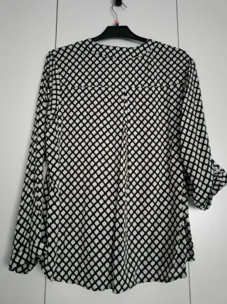 Blusa BEKENCO negra y blanca