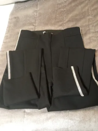 Leggings negros con brillos plateados