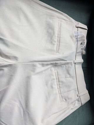 Pantalón de vestir Uniqlo beige