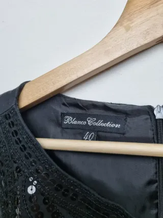 Vestido negro de lentejuelas para nochevieja