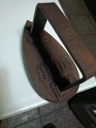 Plancha antigua de hierro fundido