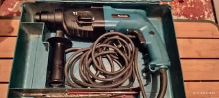 Taladro percutor Makita con maletín