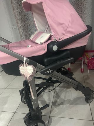 Carrozzino neonata rosa con cuoricino