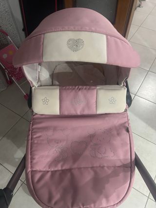 Carrozzino neonata rosa con cuoricino
