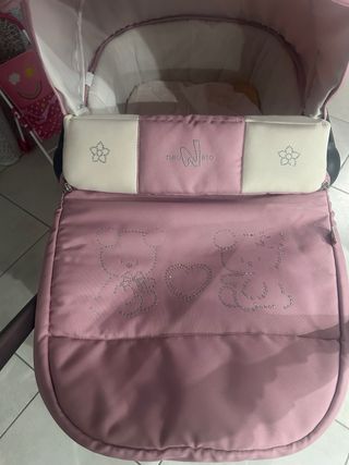 Carrozzino neonata rosa con cuoricino