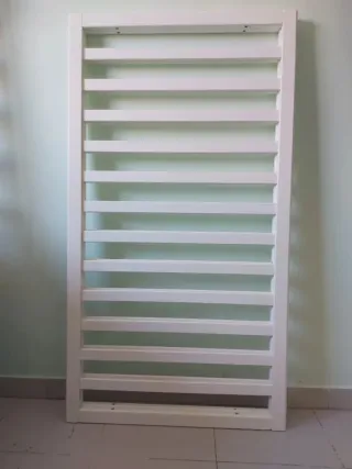 Cuna de bebé con ruedas y estrella