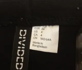 Minifalda negra recta Divided Talla 34