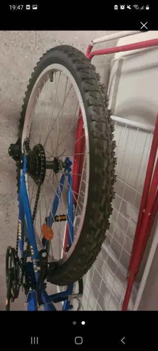 Bicicleta azul marca ATRACTOR