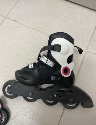 Patines en línea negros y blancos