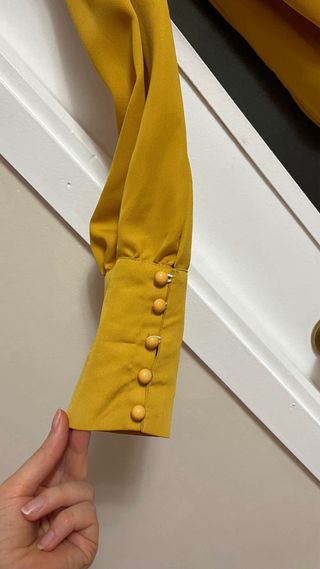 Blusa cruzada manga larga