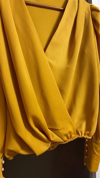 Blusa cruzada manga larga