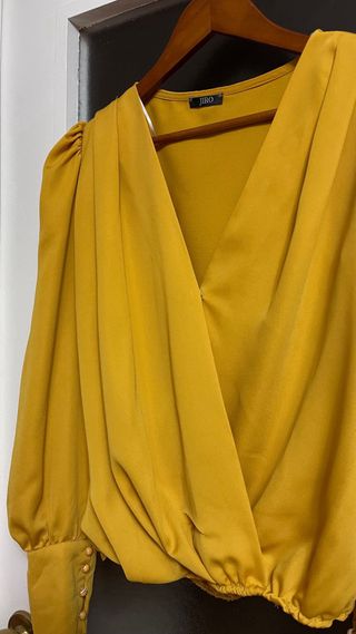 Blusa cruzada manga larga