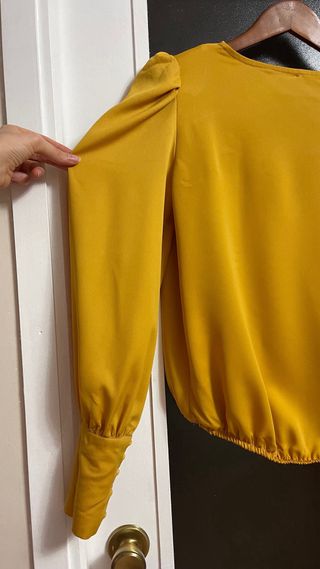 Blusa cruzada manga larga