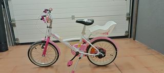Bicicleta infantil rosa y blanca