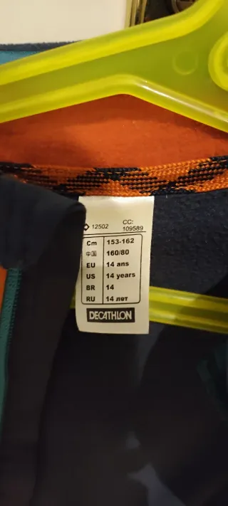 Abrigo Quechua azul y naranja