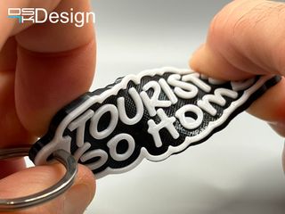 Llavero "Tourists Go Home" en TPU (flexible)