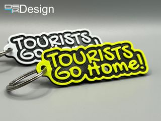 Llavero "Tourists Go Home" en TPU (flexible)